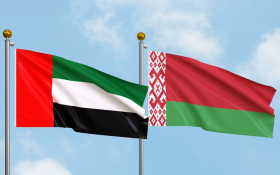 UAE and Belarus flags, representing the new trade and investment agreement